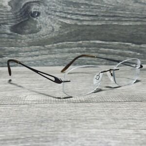 Charmant CH10934S Eyeglass Frames 52-17-135 Brown Titanium Mens Rimless